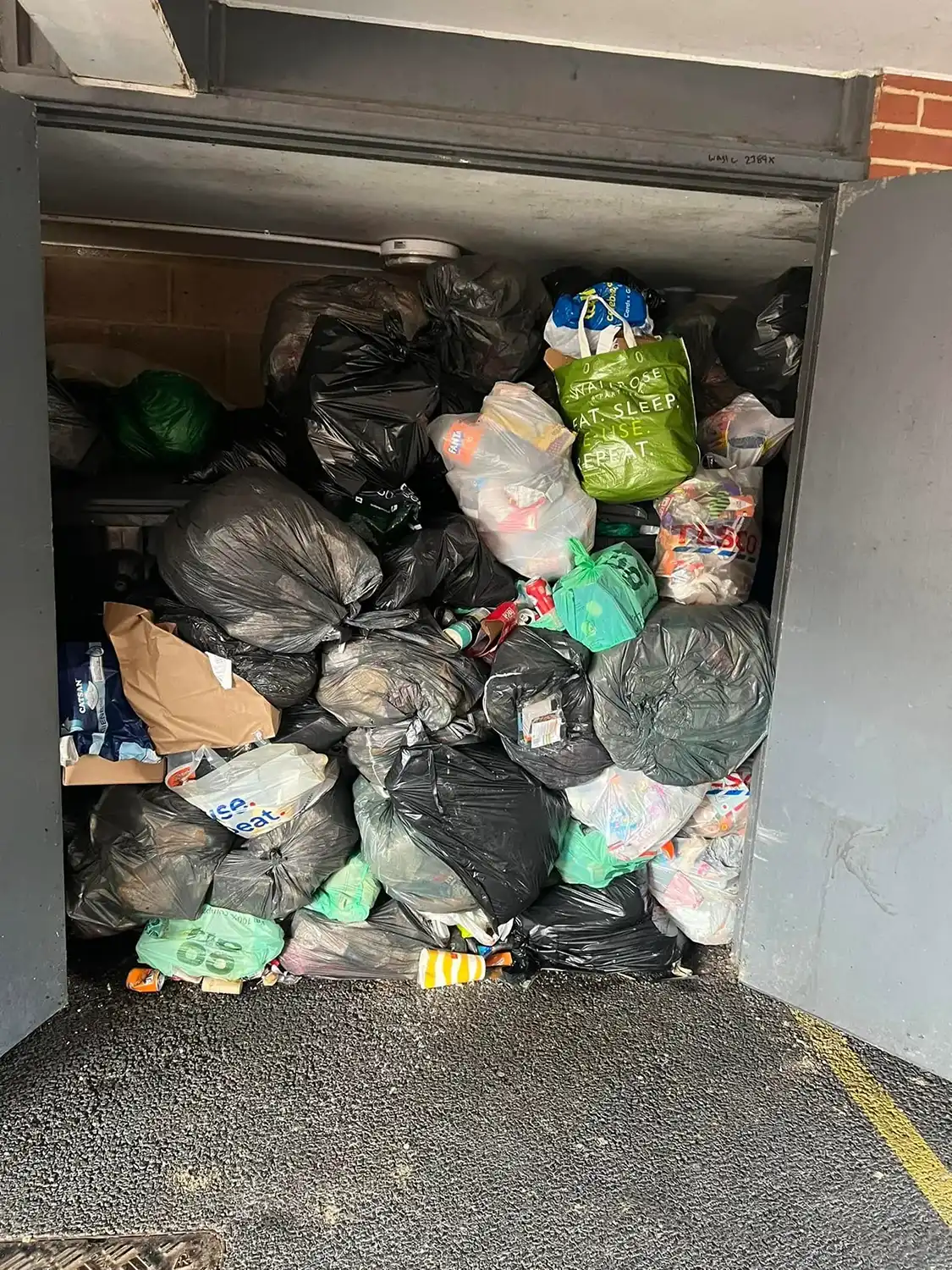 A garage full of rubbish.