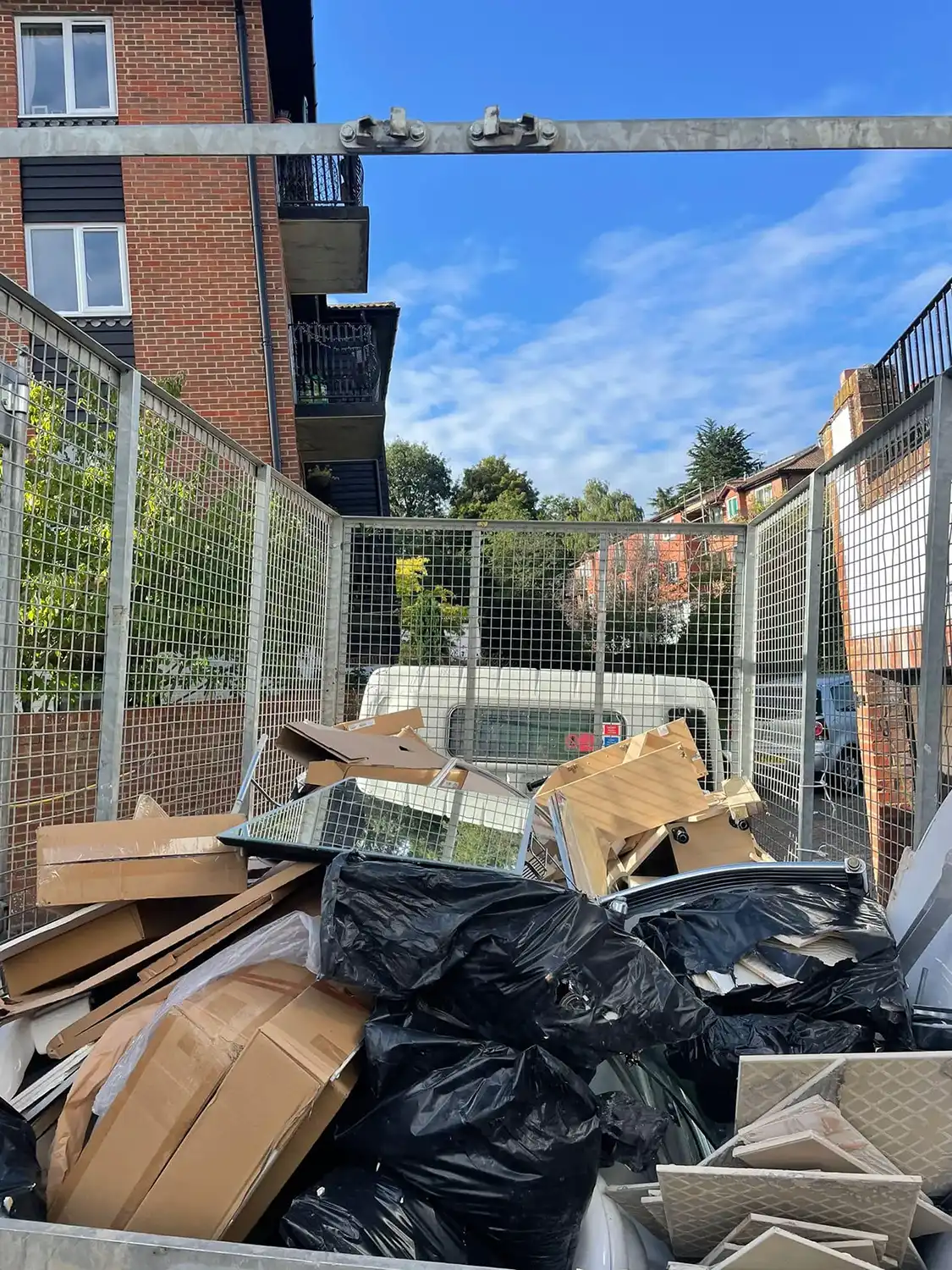 A pile of rubbish sitting in front of a building.